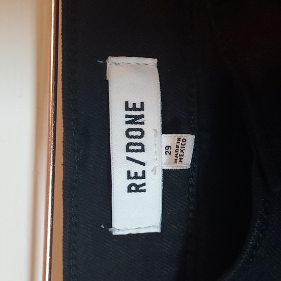 RE/DONE 70s frayed high-rise bootcut jeans in Black - Picture 8 of 16